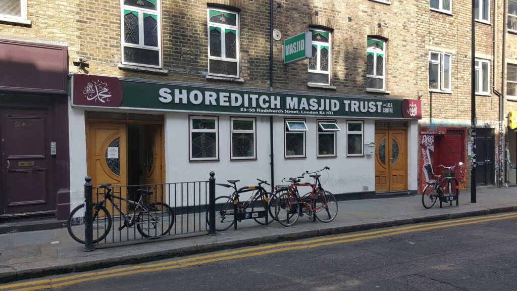 A sleek contactless donation kiosk at Shoreditch Mosque showing a 35% increase in total donations.